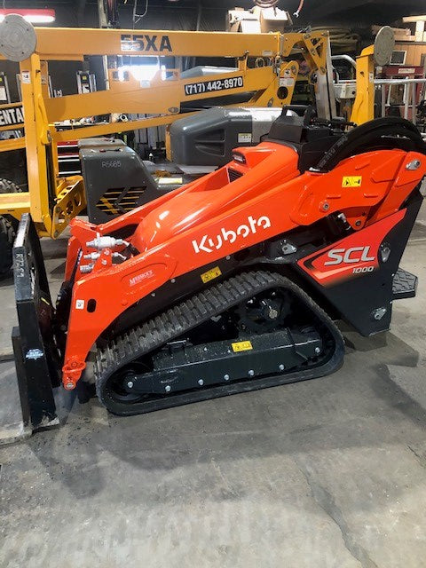 Ditch Witch SK800 Mini Track Stand On Loader Rent. Kubota SCL1000 (2)