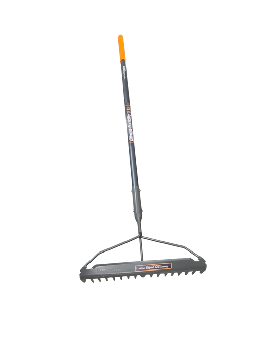 A Fiskars PRO garden rake featuring a dual-sided head with rigid teeth and a smooth grading edge, connected to a long grey handle with an orange grip.
