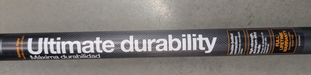 Close-up of the Fiskars PRO garden rake handle and connection point showing the carbon-fiber-look finish, double-bolted construction, and warranty information.
